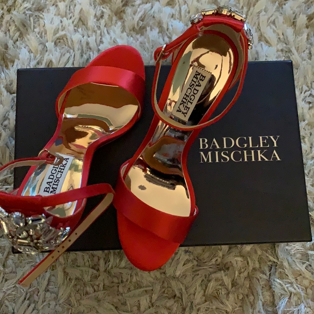 7.5 Orange Satin heel.